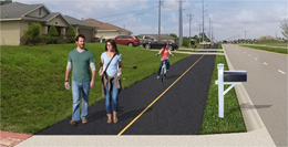 Digital rendering of two people walking and one child biking on a sun trail example, showing a wide, paved sidewalk area with a yellow line down the center